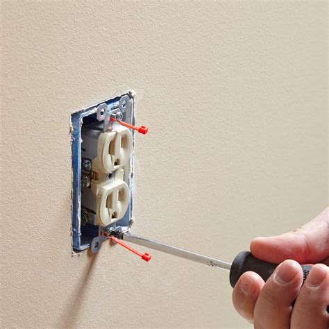 stripped electrical outlet box|metal box outlet repair.